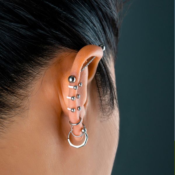 Picture of minimalist ear piercings